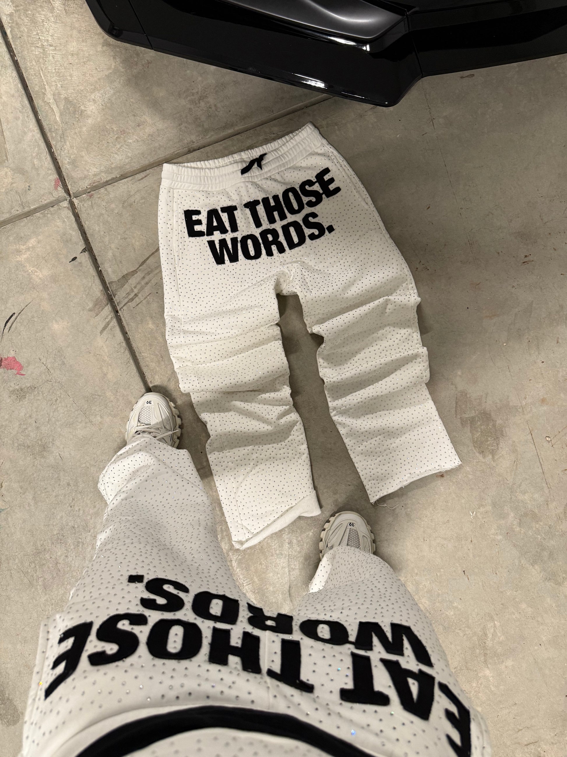 WHITE " EAT THOSE WORDS " RHINESTONE SWEATPANTS